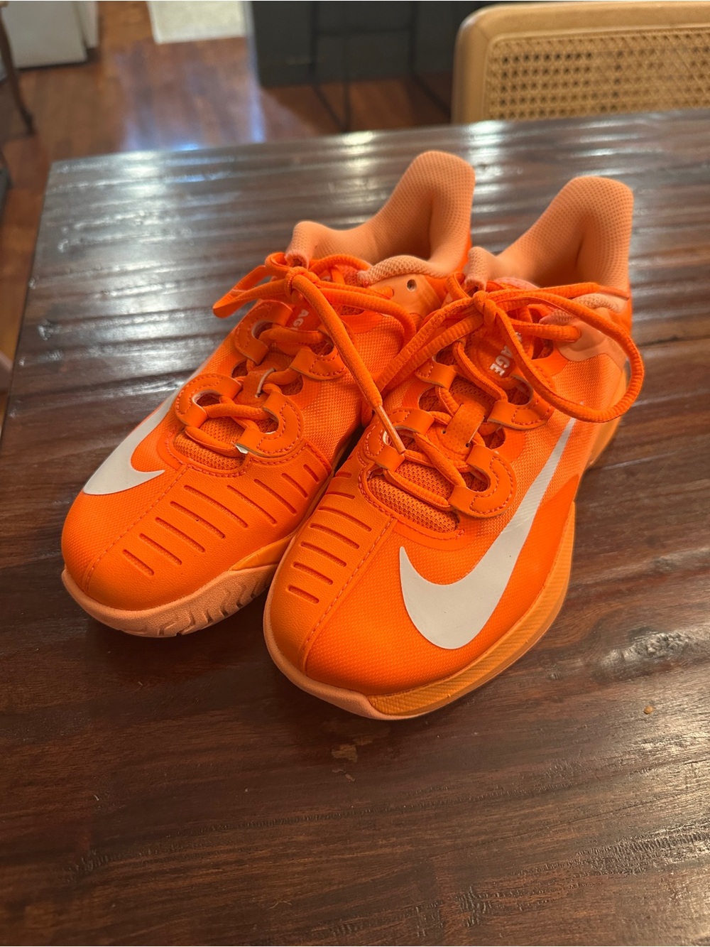 Nike Orange Sneakers with White Swoosh